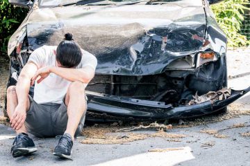 Auto accident - guy by the road